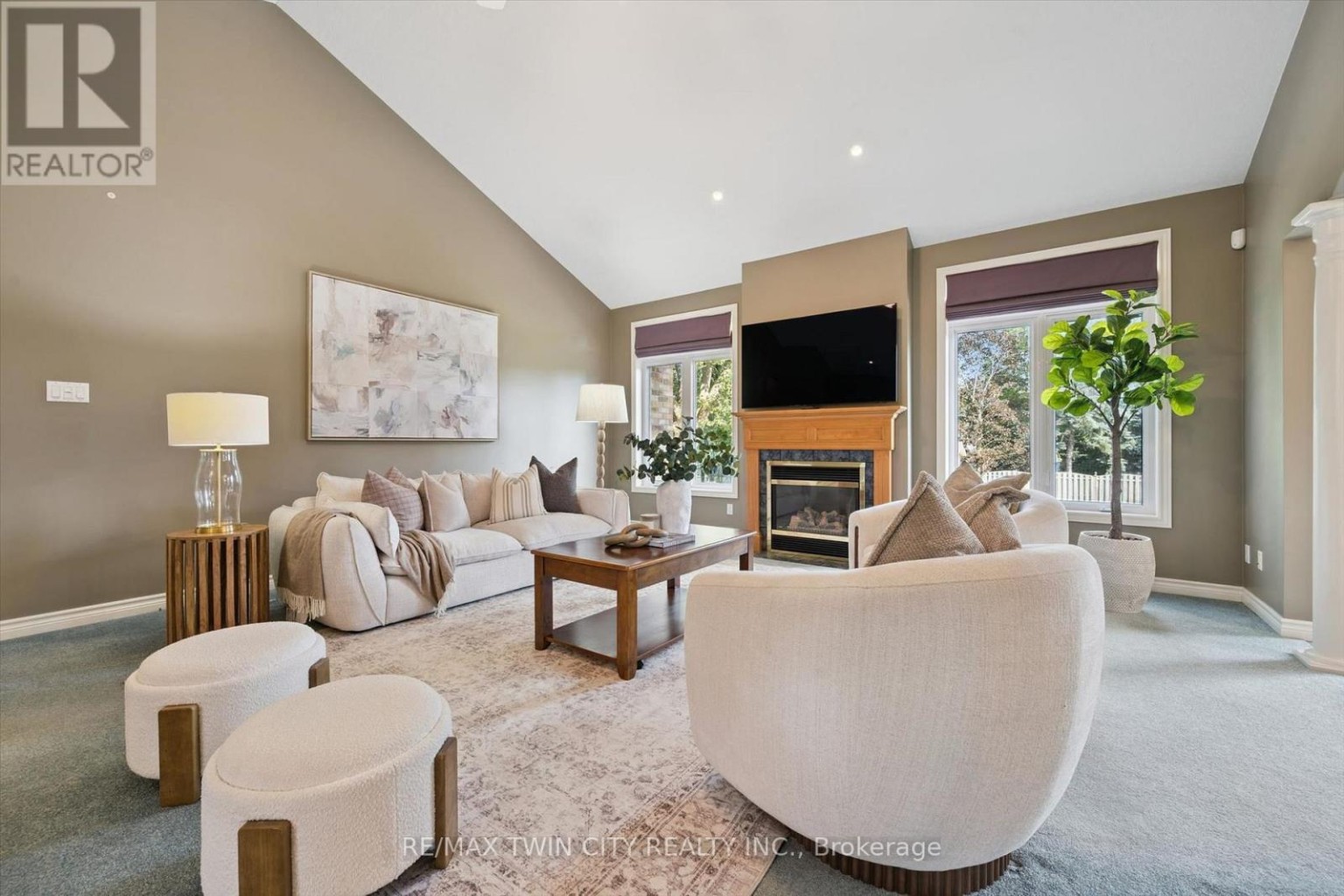 After: living room professionally staged with light furnishings