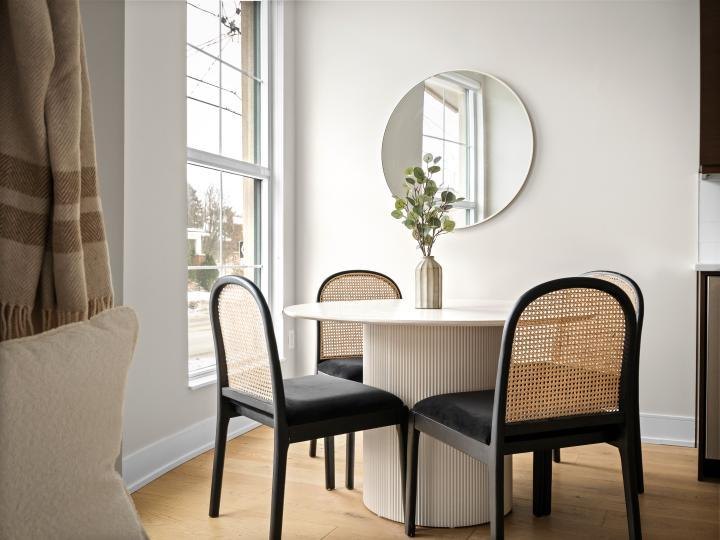 Intimate breakfast nook with cane back dining chairs